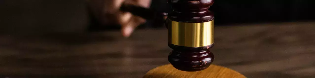 A judge striking a gavel