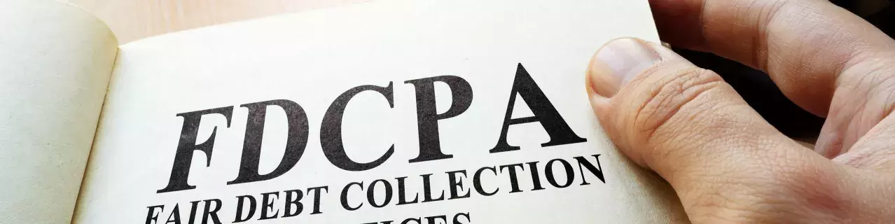 A picture of a book showing the Fair Debt Collection Practices Act