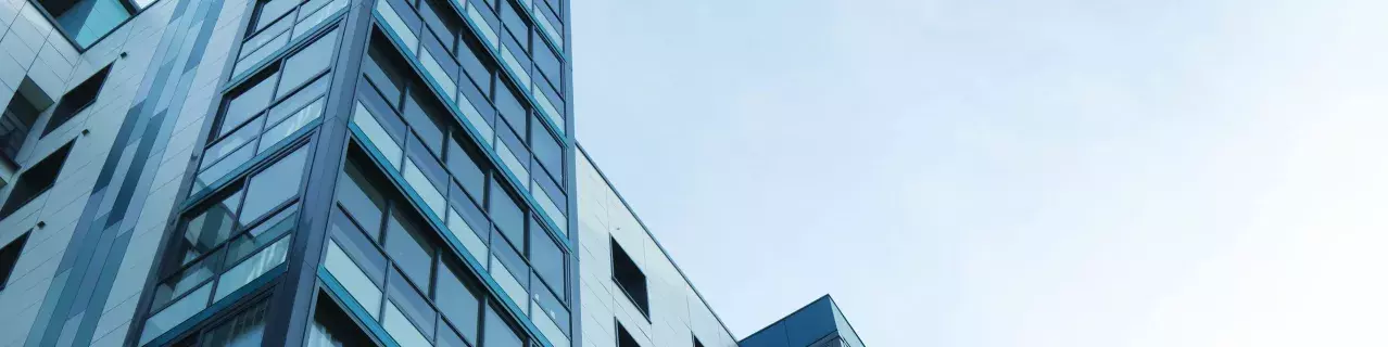 A photo looking up at an office building.