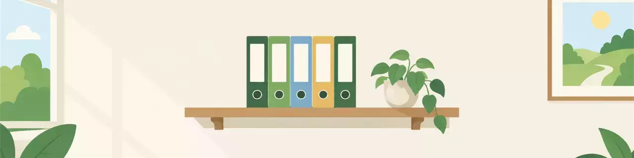Row of file binders on office shelf