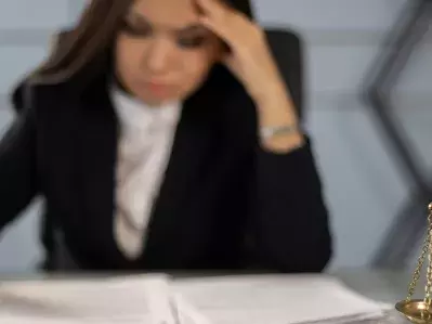 A lawyer looking over paperwork