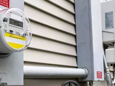 A photo of an electric meter on a home.