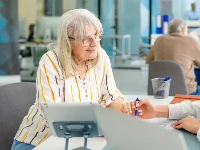 A person at a bank applying for a loan