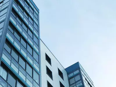 A photo looking up at an office building.