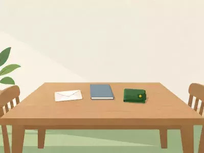 Pay envelope with calculator and cash on desk