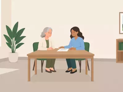 Bank representative meeting with client in office