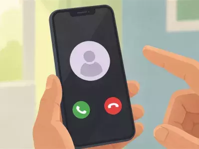 Hand holding smartphone with incoming call